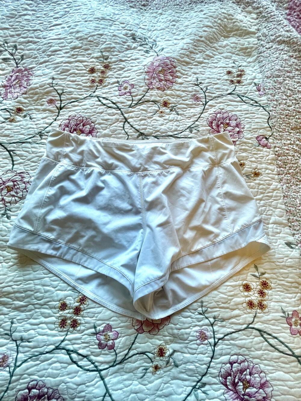 white lululemon running shorts